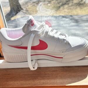 Nike White Leather Shoes with Vibrant Coral Swoosh